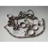 A bag of mixed silver rings, chains and bracelets