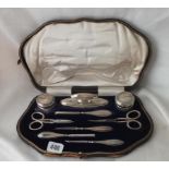 Boxed eight piece manicure set engraved with leaves, B’ham 1913