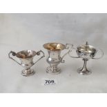 Group of three small trophy cups, 88g.