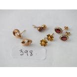 Four pairs of 9ct ear studs