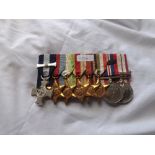 GOOD GROUP OF EIGHT MEDALS to commander A.H. Diack D.S.C R.N. with Malaya bar and the D.S.C. medal