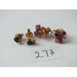 Pair of 14ct ruby and diamonds set earrings and a pair of sapphire and diamond earrings