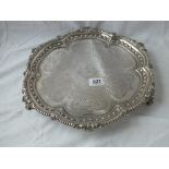 Attractive late Victorian salver with engraved and crested centre on 3 claw and ball feet – 12”