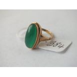 Oval green stone ring set in gold – 4.3gms – size J