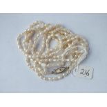 Triple strand river pearl necklace