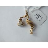 9ct charm in the form of a stork with baby – 3.9gms