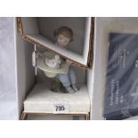 Boxed figure ‘what a surprise’ – 7” high