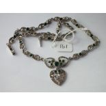 A multi-link silver and paste necklace with central green stones & heart drop