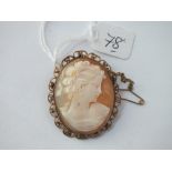 Gilt mounted oval cameo brooch of a lady