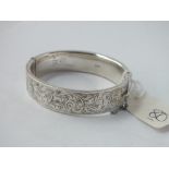 Wide scroll engraved silver bangle 23g