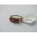 9ct three stone garnet ring approx. size J