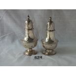 Pair of baluster shaped pepper casters with urn finials – Sheff 1909 70gms