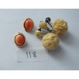 Bag containing a pair of coral and carved ivory earrings