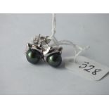 Pair of 18ct gold green pearl earrings ensuite -5gms