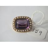 Attractive amethyst and pearl set brooch set in gold
