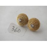 Pair of 18ct beehive shaped earrings each with diamond, 11.3g