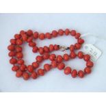 Coral bead necklace with gold ring bolt