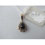 White and blue sapphire pendant in 9ct