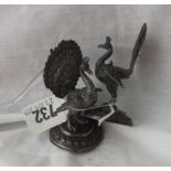 Pair of eastern menu holders in the form of peacocks 3” high