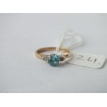 Blue zircon ring with diamond shoulders set in 9ct, size K, 2.1g