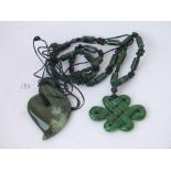 2 jade type pendants