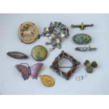 11 various silver mounted brooches