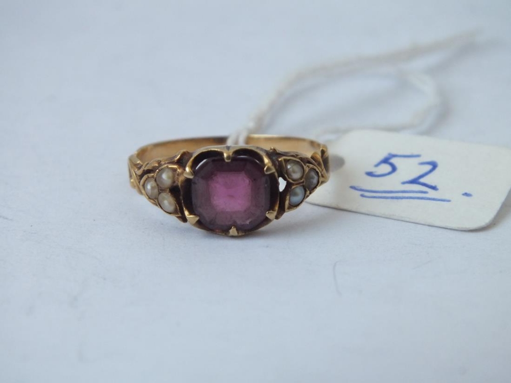 Antique garnet and pearl ring set in gold scroll mount, size N