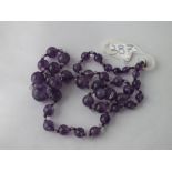 Amethyst coloured bead necklace