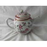Chinese bullet shaped tea pot and cover painted with sprays of flowers 6” high