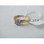 Diamond cluster ring set in 18ct, size L, 2.5g