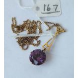 Purple stone pendant on 14ct chain