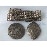 Eastern metal belt, large brooches etc.,