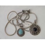 Silver and stone set pendants on chains, 80g