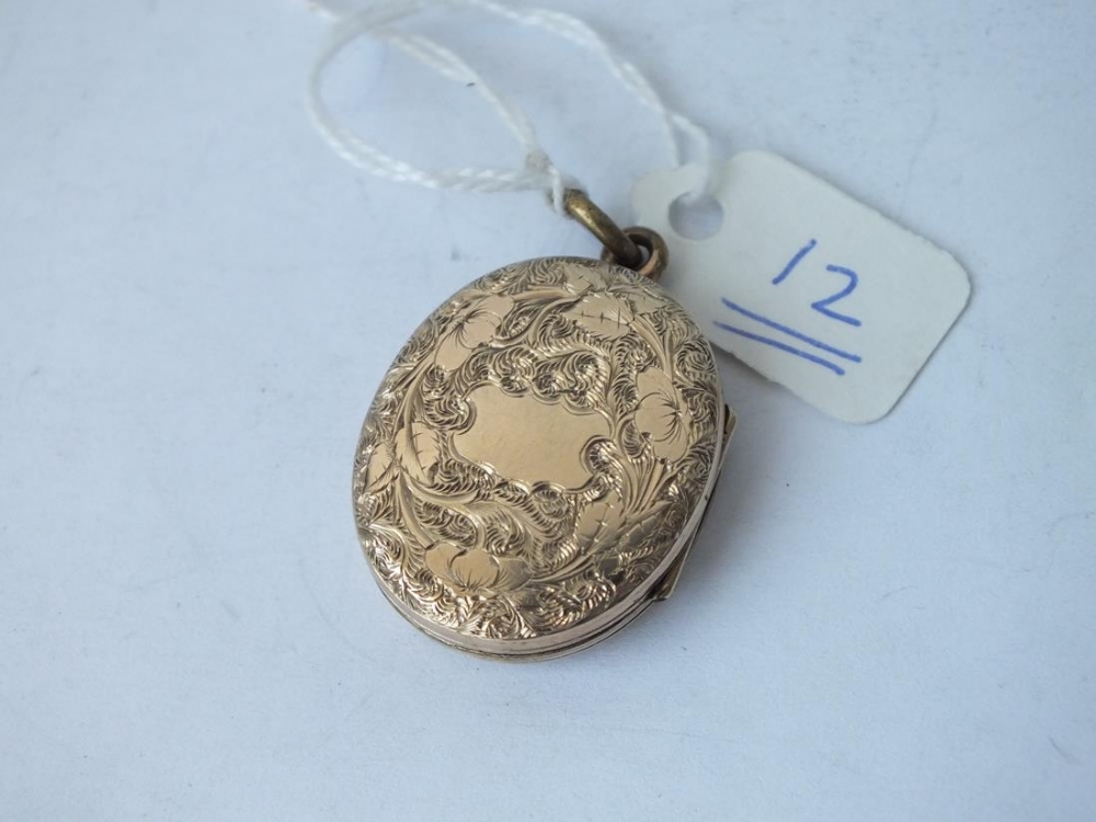 Victorian 9ct back and front hinged locket with photo interior