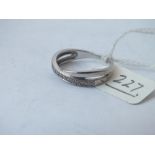 Silver ring set with a row of diamonds, size Q