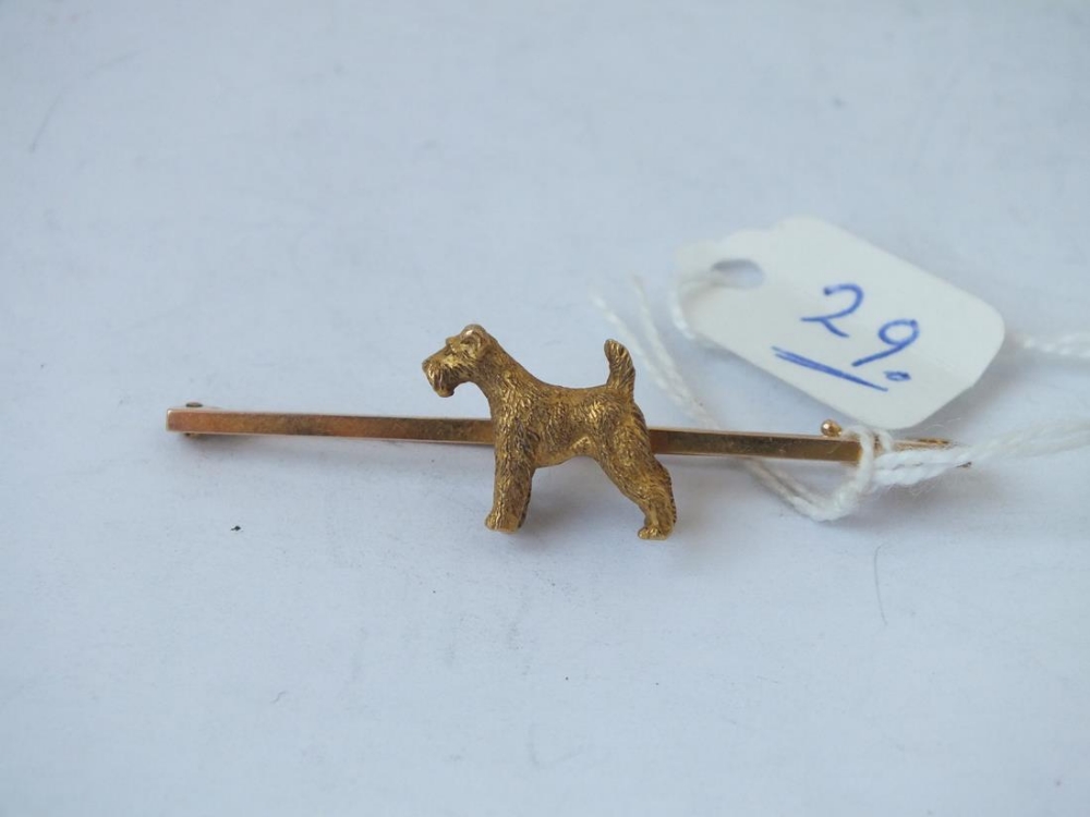 15ct brooch applied with a dog, 5.1g