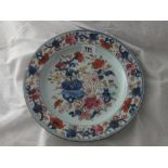 Chinese plate painted with vases of flowers 10” dia.