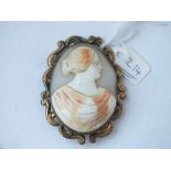 Oval carved cameo with gilt frame