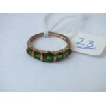 9ct ring set with 5 green stones, size N, 2.1g