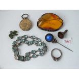 Amber large brooch, a paste bracelet etc.