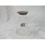 A whisky jug with silver hinged cover and glass body 4” high 1909