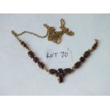 A garnet mounted necklace/pendant