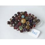 An old semi-precious stone set brooch – 2.5” wide