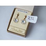 A pair of 9ct gold mounted and crystal ear pendants, boxed