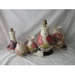 Two Moorcroft lamps, two vases and jar & cover