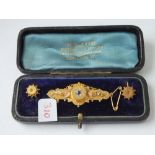 Boxed Victorian brooch in two colour gold with a pair of ear studs With rose diamond centre’s