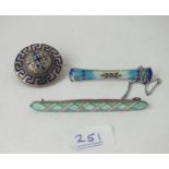 Three antique silver and enamel brooches