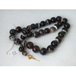 A string of banded agate beads
