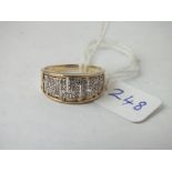 A diamond Greek key pattern ring set in 9ct, 3.2g, size O