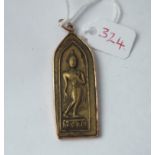 Gold mounted and brass deity pendant with figure